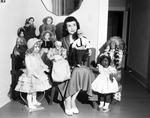 Johnnie Elia Shown with Some of Her 125 Doll Collection