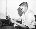 John Howard Griffin, Blind Author shown at Typewriter