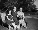 Mrs. John F. Stuart and Children, John G. and Lnn Shown with Dog, Mike