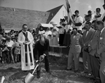 Ray F. Holmes breaks ground for parochial school