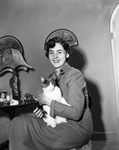 Miss Diane Ismay and her Siamese cat