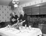 Society Series on Thanksgiving table settings. Finishing Touches: Mrs. W. O. Kelly assisted by Mrs. Jack Kelly