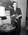 Dr. Gladys Falshaw arranging flowers