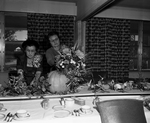 Mrs. C. E. Worsham and Mrs. A. B. Steinman decorating table for Thanksgiving