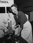 Mrs. W. E. Talbert with her flower arrangement
