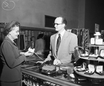 Mrs. J. G. Sutherland and Tom Pryor at department store