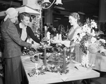 Mrs. George Hill and daughter, Patsy, plan Christmas decorations