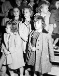 Children singing at Christmas tree