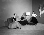 Jean Joy Johnson, Patsy Luther, and Nancy Davis modeling skirts and dresses by Bob Bain