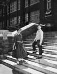 Nancy and John Unger modeling clothes to be worn at school by Bob Bain