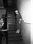 Mrs. Lawrence Tarlton examines stairway in hospital by Dub McPhail