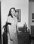 Mrs. J. Robert Cochran in formal shot in living room