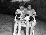 Terry and Sadie Long with puppies