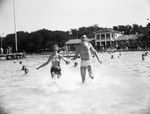 Frank Ryan splashing with girlfriend Lucille Horn
