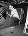 Buddy Oujesky working on attic fans