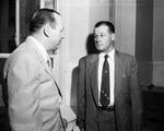 Herbert E. Arnold, confers with his attorney, Bill Fonville by Joe McAulay