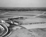 Fort Worth, Aerial views. Heavy midafternoon air traffic at Amon Carter Field is shown in photo. Six airliners loading and unloading by Bob Bain