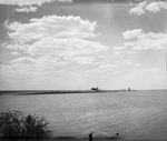 A view from upstream of the new Falcon Dam on the Rio Grande showing the spillway and the Mexican intake tower