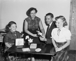 Boy Scouts, Girl Scouts: Mrs. Otis Niles with Prudence Vader, Fred W. Bondurant Jr. and Diana Havrda