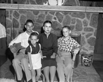 Mrs. W. T. Scaggs with her sons, Roger, Tommy and Phillip