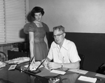 Rule, Texas Farmers National Bank. Morris Neal, cashier and Mrs. Cathryn Thane, teller
