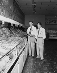 Early T. Denman and Clyde Eicke, managers of Furr Food Store