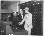 Amon Carter (right) and Brigadier General David Sarnoff, chairman of R. C. A.'s board, close the switch at WBAP-TV inaugurating first live color telecast from a Texas studio