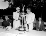 Colonial Invitational Tournament. presentation. Amon Carter presents trophy to Johnny Palmer
