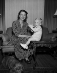 Mrs. H. E. Carlin, and his son Michael Lee