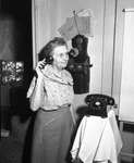 Mrs. Mabel Scott makes a telephone call