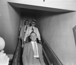 David F. Hagler Jr. (dark glasses) with attorneys Aultman (top) and Byron Mathews