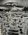 Model Janet Jones with some of the parts for the "Golden Chevrolet"