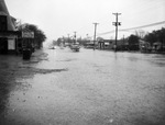 Motorists on flooded East Belknap Street, Fort Worth, Texas