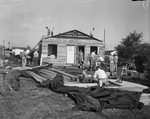 Repair of Mrs. Fern Burns residence in White Settlement, Texas