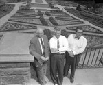 S. Herbert Hare, L. G. McLean, and H. H. Hittson, posed above Rose Garden