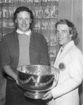 Mrs. W. A. (Anna) Stripling Jr. presents trophy to Polly Riley