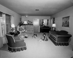Mrs. Robert M. (Margie) Drewry and children in the family residence, 4332 West Clayton Road, Fort Worth, Texas