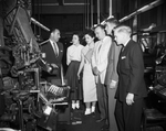 Journalism Students watching Linotype machine