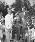 Gordon Harriman, O. Gene Murray, children, and baby elephant