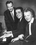 George Bragg at the piano with Istvan Szelenyi and his wife, Kato