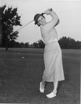 Babe Didrikson Zaharias swings a golf club