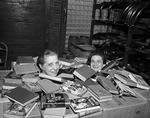 Mildred Gale and Sarah Blum prepare for Book Fair