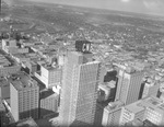 Skyline view of downtown Fort Worth showing Continental National Bank with clock revolving on roof