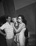 Bill Hardin, dau. Brenda Kay, 2, and grandmother Mrs. Velma Hardin after she had been kidnapped from in front of tavern