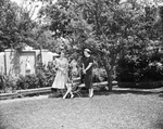 Mrs. Thomas M. Ryan, Mrs. J. W. Mitchell and David Rankin in Mitchell patio