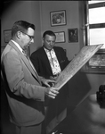 F.C. Turner, left, and A.C. Taylor, U.S. Bureau of Public Roads men, visiting here and discussing interstate highway program
