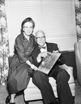 Dr. E. Leslie Carlson and wife