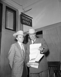 Clement Bailey, left, charged with forgery in insurance, with Doss Hardin, his attorney