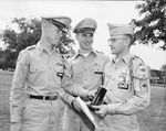 Honored at awards presentation drill of the Arlington State College ROTC unit were Gary C. Hitt of Fort Worth, Charles E. Feuerbacher, and Robert C. Musgrove