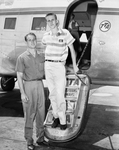 Elmer Brown greets Ray Cunningham of Refugio at Amon Carter Field